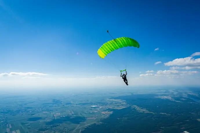 a person parachuting in the air